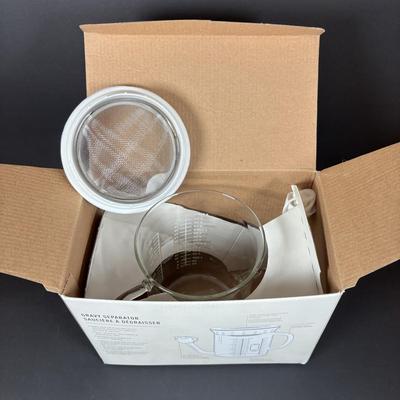 LOT 84: Cuisinart Compact Deep Fryer In Box, (2) Cuisinart 10" Frittata Pans, Glass Gravy Separator in Box, Cutting Board and More