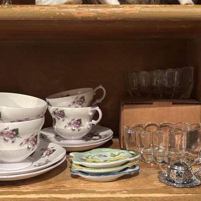 LOT 85: Kitchen Cabinet Lot - Contents Include China, Glasses Teapot Crystal and Much More