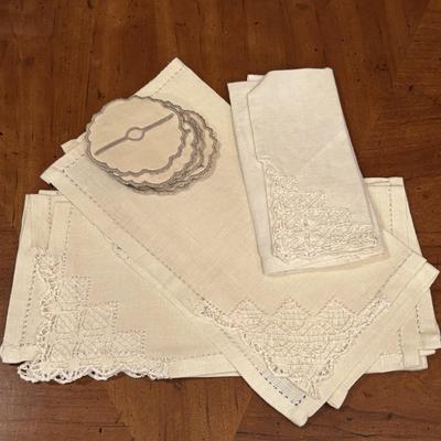 LOT 92: Assortment of Lacy ,Embroidered and Holiday Table Linens and More