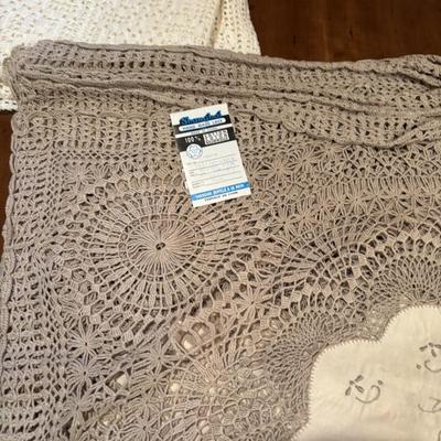 LOT 92: Assortment of Lacy ,Embroidered and Holiday Table Linens and More