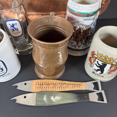 LOT 104: Collection of Copper, Glass and Ceramic Beer Steins and Mugs Lowenbrau and More, Romana Caffe Copper Tray, and Other Bar Must Haves