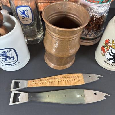 LOT 104: Collection of Copper, Glass and Ceramic Beer Steins and Mugs Lowenbrau and More, Romana Caffe Copper Tray, and Other Bar Must Haves