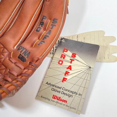 LOT 163: Baseball Collection - Autographed Baseball in Protective Stand (Bob Uecker), Wilson Pro Staff Glove, Worth Tennessee Thumper...