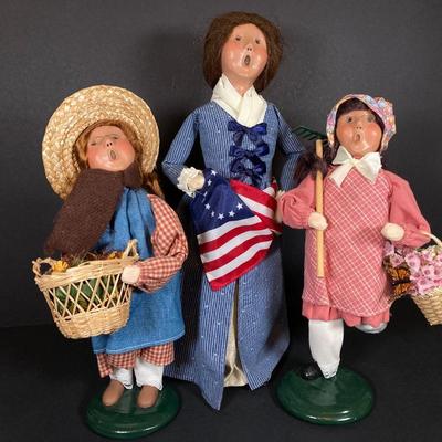 LOT 165: Byers' Choice Ltd Betsy Ross with US Flag, Girl with Straw Hat /Basket and Girl with Rake, Flower Basket