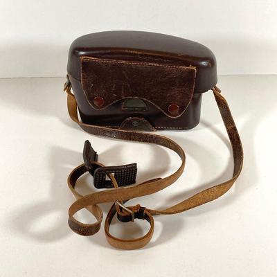 LOT 166: Vintage Photographer's Equipment Collection - Tripods, Cases, Lenses and More