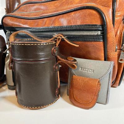 LOT 166: Vintage Photographer's Equipment Collection - Tripods, Cases, Lenses and More