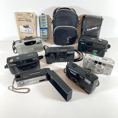 LOT 168: Vintage Camera / Equipment Collection - Canon, Kalimar, Kodak, Konica Minolta, Disney Mickey Mouse Case and More