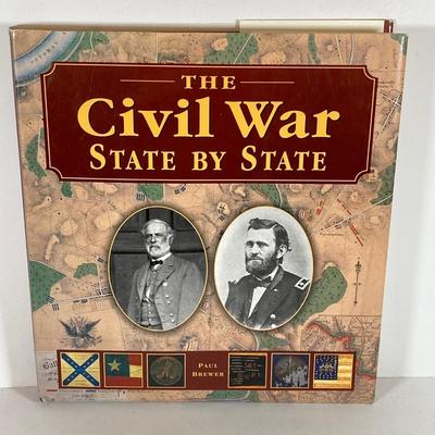 LOT 170: Three Vintage Military Rounds, Bugle Horn, Miniature Canon (Italy) and The Civil War State by State Book