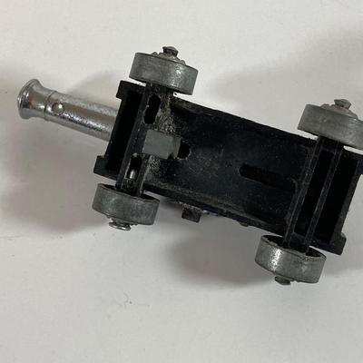 LOT 170: Three Vintage Military Rounds, Bugle Horn, Miniature Canon (Italy) and The Civil War State by State Book