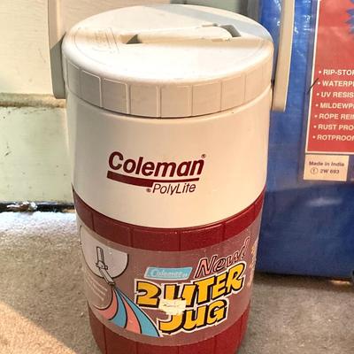 LOT 174: Camping Collection - Cookware, Folding Zip Up Blanket, Trimarc Rod Caddy, Tarp, Coleman Drink Cooler, Aladdin Thermos and More