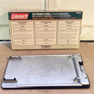 LOT 176: Coleman Collection in Original Packaging - Two Burner Portable Propane Stove, Cast Iron Griddle and Two Tanks