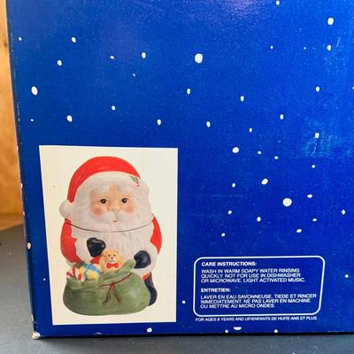 LOT 196: Holidays with Dunkin, Coke and Starbucks- Cups, Glasses, Canister, a Musical Santa Cookie Jar, Glass Stir Sticks and More