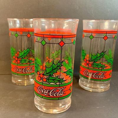 LOT 196: Holidays with Dunkin, Coke and Starbucks- Cups, Glasses, Canister, a Musical Santa Cookie Jar, Glass Stir Sticks and More