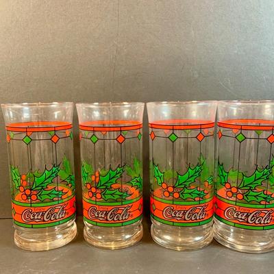 LOT 196: Holidays with Dunkin, Coke and Starbucks- Cups, Glasses, Canister, a Musical Santa Cookie Jar, Glass Stir Sticks and More