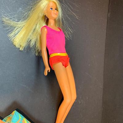 LOT 197: Vintage Barbie Doll Case (1968) Loaded with Groovy 60's Clothing; Babrie (1966), Francie (1966) and Little Kiddies Dolls