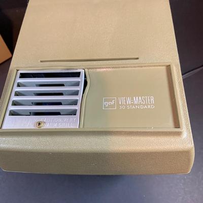LOT 203: View-Master Projector with a Box of View-Box of Master Stereo Picture Sets - Snow White, Wizard of Oz, Woody Woodpecker,...