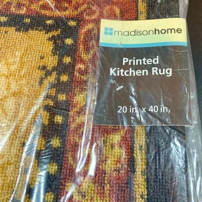 LOT 206: Large Assortment of Unopened Area Rugs In Various Sizes and Shapes.