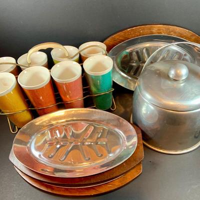 LOT:207 Set of 8 Raffiaware Cups, Aluminum Ice Bucket and Aluminum Steak Platter with Wood Base