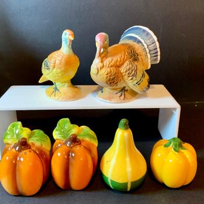 LOT 208: Autumn Decor Featuring Ceramic Pilgrim Head and Hands, Lefton Witch on Pumpkin Lighted Figure, Peanuts Halloween Figures, Salt...