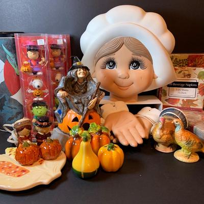 LOT 208: Autumn Decor Featuring Ceramic Pilgrim Head and Hands, Lefton Witch on Pumpkin Lighted Figure, Peanuts Halloween Figures, Salt...