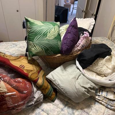 Pillows, throws, curtains and a wicker basket
