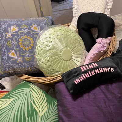 Pillows, throws, curtains and a wicker basket