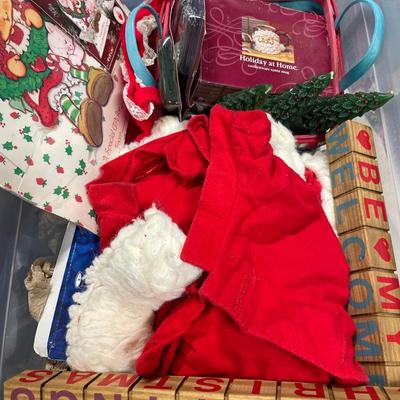 Santa suit with other decor includes tote with lid
