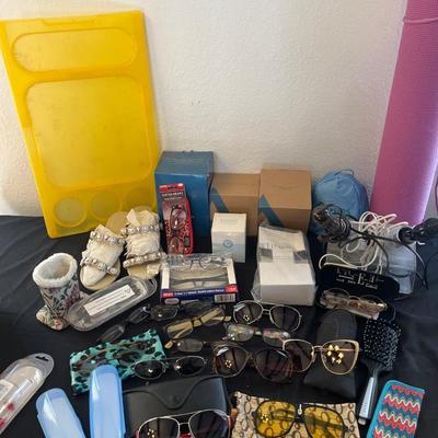 Mark Jacobs sunglasses, readers, candles, bank, shoes, yoga mat