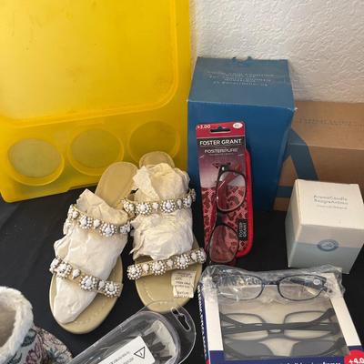 Mark Jacobs sunglasses, readers, candles, bank, shoes, yoga mat