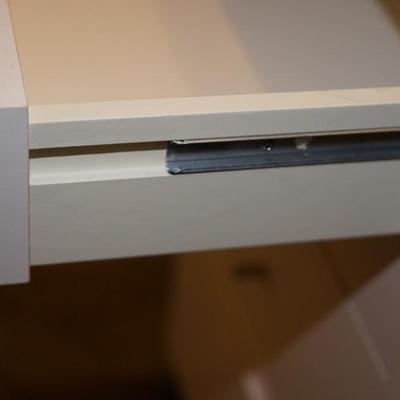 GROUPING OF THREE FOUR DRAWER CABINETS W/ WHITE LAMINATE QUALITY