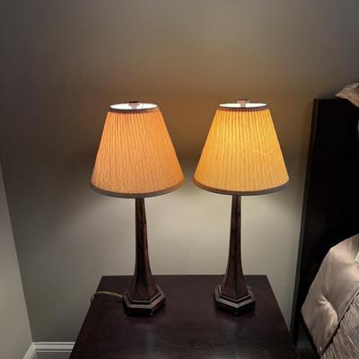 Sale Photo Thumbnail #23: The GO&SO table lamp is designed for the living room with a traditional style. It features a dark wood finish and a beige fabric bell-shaped shade. Constructed from wood and fabric, it uses LED lighting technology and is powered by a wall plug-in. The lam