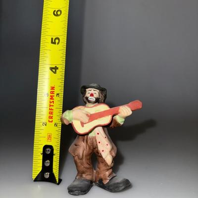 Vintage Emmett Kelly Jr. clown figurine with a guitar