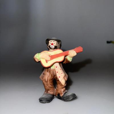 Vintage Emmett Kelly Jr. clown figurine with a guitar