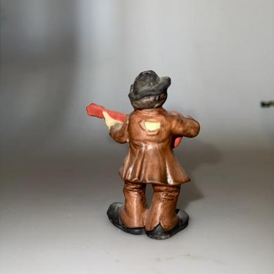 Vintage Emmett Kelly Jr. clown figurine with a guitar