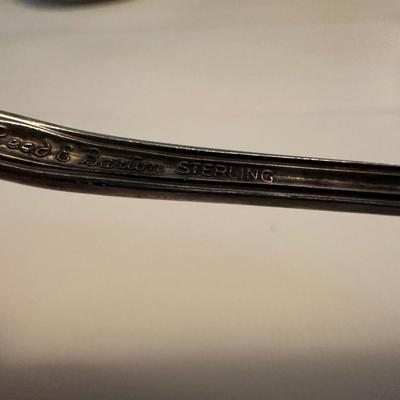 Lot of Silver items including a set of salt and Pepper shakers.