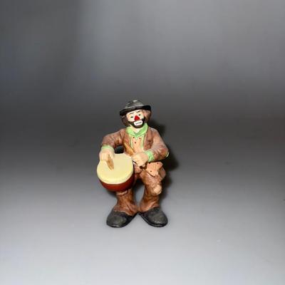 VintageIntroducing the Emmett Kelly Jr. clown figurine featuring a drum.