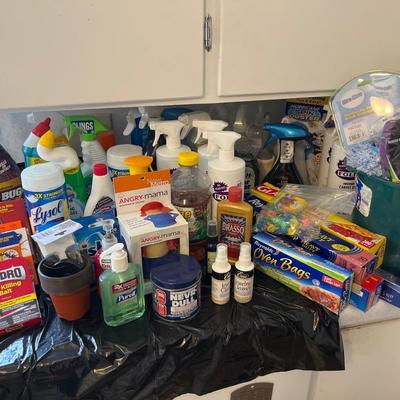 Large group of cleaning supplies