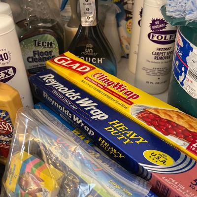 Large group of cleaning supplies