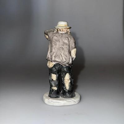 Emmet Kelly Jr. clown figurine looking out