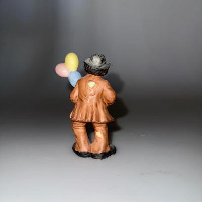 Emmett Kelly Jr. Figurine featuring him holding three balloons