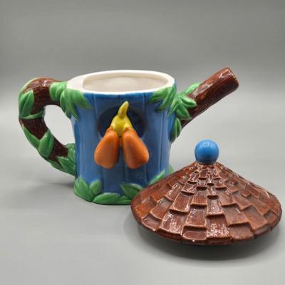 LOT 61B: Looney Tunes Teapot and Group of Whimsical Salt and Pepper Shakers