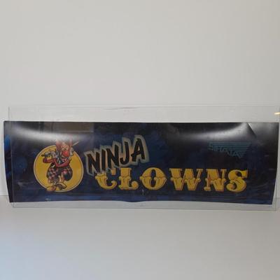 LOT 80B: Bust-A-Move Again Ex, Ninja Clowns, and Police Trainer Pinball Machine Marquees