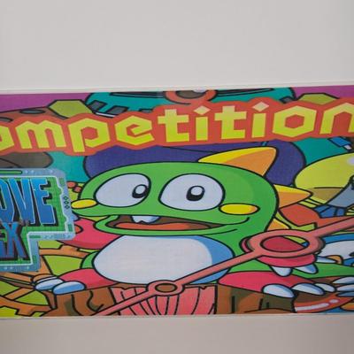 LOT 80B: Bust-A-Move Again Ex, Ninja Clowns, and Police Trainer Pinball Machine Marquees