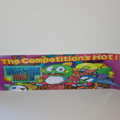 LOT 80B: Bust-A-Move Again Ex, Ninja Clowns, and Police Trainer Pinball Machine Marquees