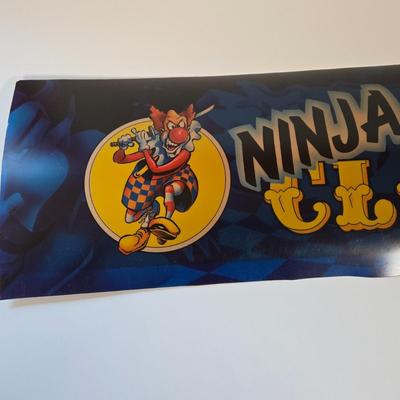 LOT 80B: Bust-A-Move Again Ex, Ninja Clowns, and Police Trainer Pinball Machine Marquees