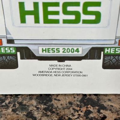 LOT 83C: Hess Trucks w/ Box - Sport Utility Vehicle w/ Motorcycles, Emergency Truck & More