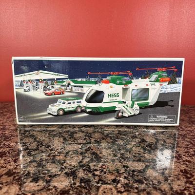 LOT 83C: Hess Trucks w/ Box - Sport Utility Vehicle w/ Motorcycles, Emergency Truck & More