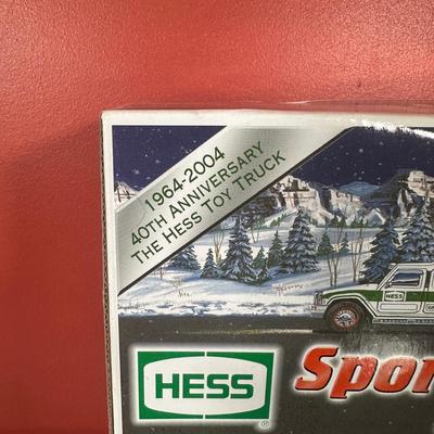 LOT 83C: Hess Trucks w/ Box - Sport Utility Vehicle w/ Motorcycles, Emergency Truck & More