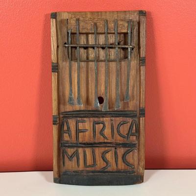 LOT 88C: Vintage Instruments - African Finger Piano, Bamboo Split Drum & More
