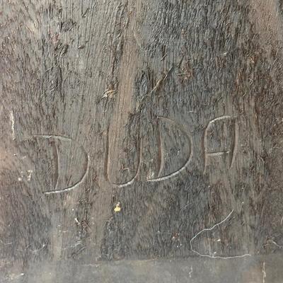 LOT 94C: Hand Carved Wooden Panel Of a Pareto Velho Signed “Duda”